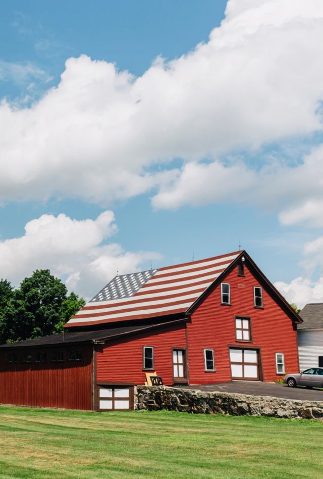 Stock Photo of Rural Barn with American Flag Roof