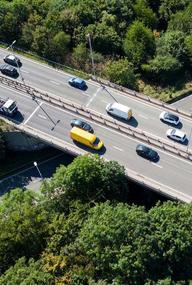 Aerial view of a highway flyover at rush hour