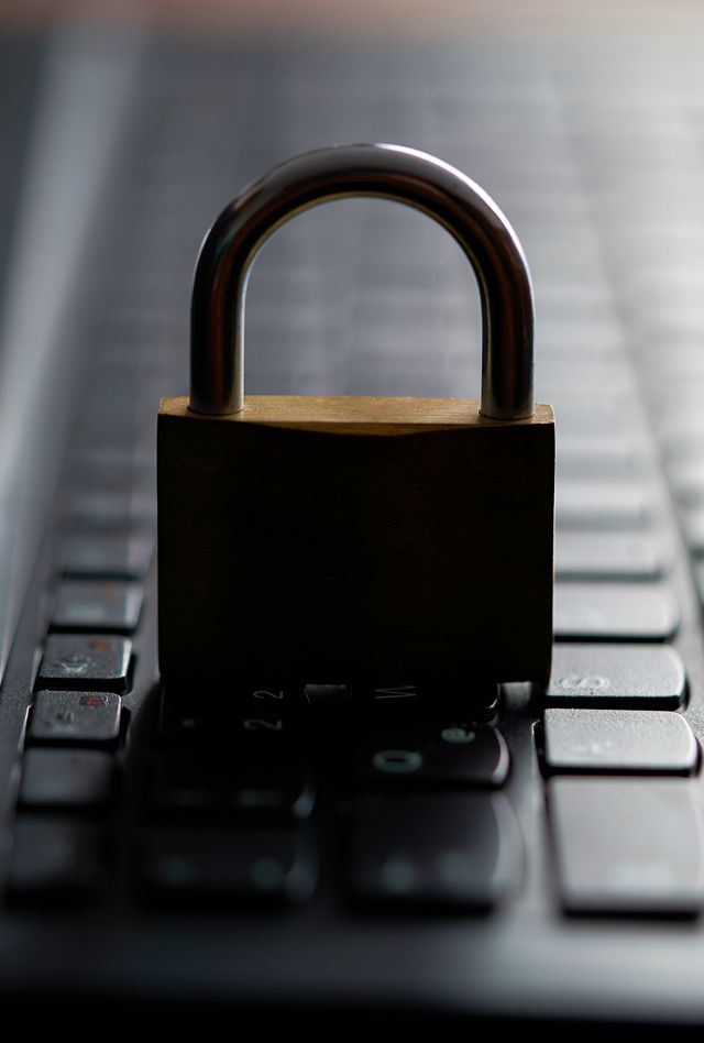 Padlock on top of a computer keyboard