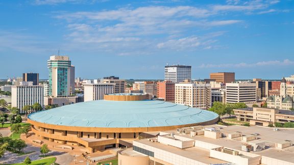 Wichita, Kansas, USA downtown skyline at dusk.