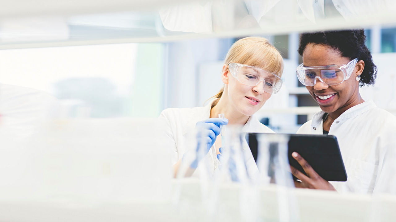Lab professional working in lab.
