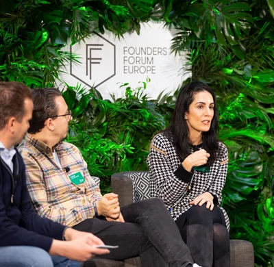 Panel discussion at Founders Forum event.