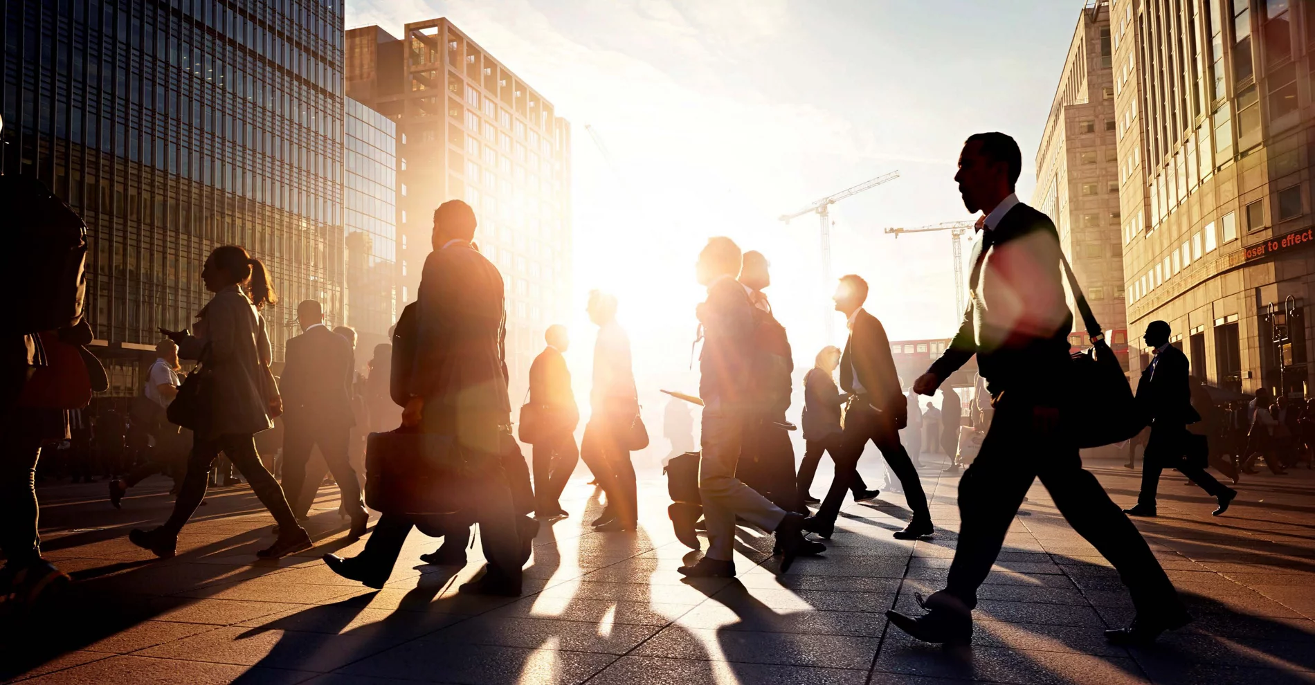 A diverse team of employees walk to office in France