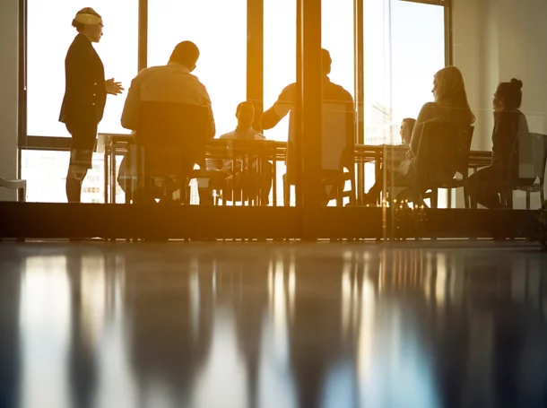 A meeting in progress in a conference room