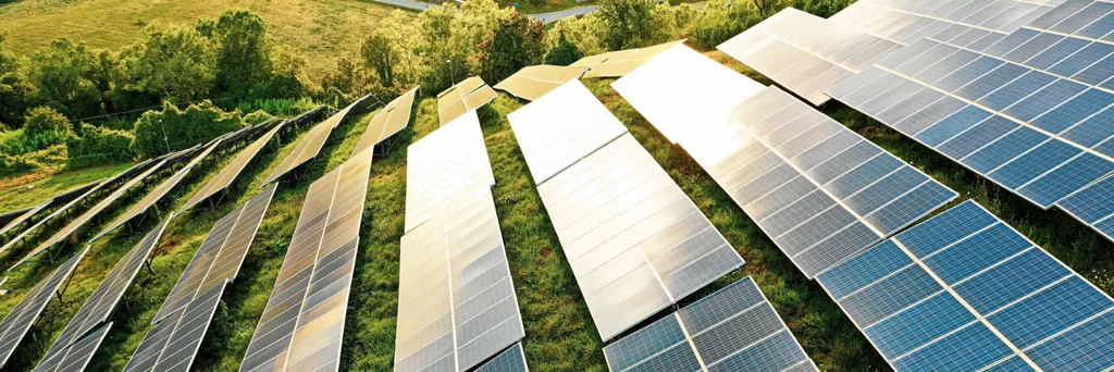 Solar panels fields on the green hills