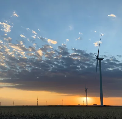 windmill with sunrise in the background