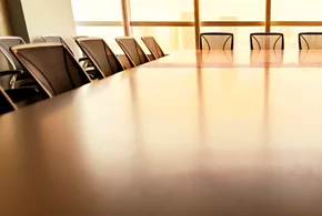 A business conference room at dusk