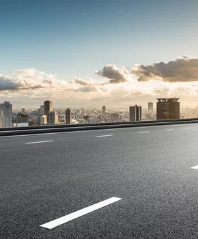 skyline of a city overlooking a road