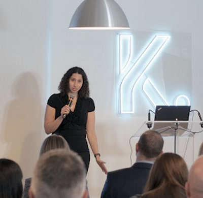 woman giving a presentation at Koru office