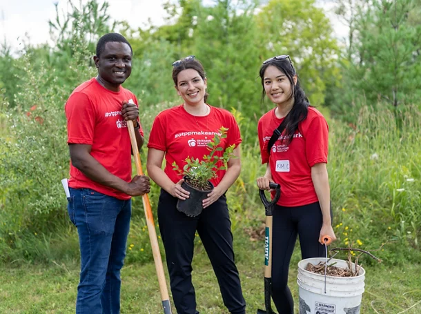 photo of three smiling employees