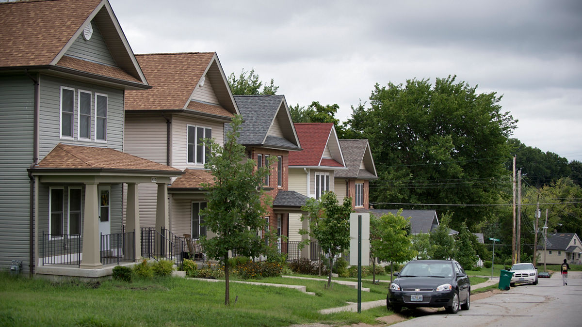 Single family homes line Beachwood Ave. in 24:1 community Pine Lawn. The homes, built by Beyond Housing, replaced dilapidated properties and offered affordable housing starting in 2012. 