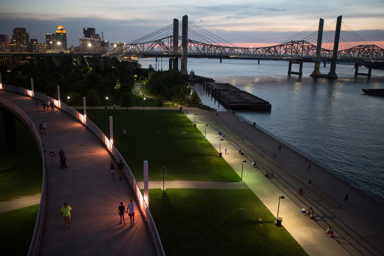 RWJF COH Louisville August 25-28, 2016 The Big Four Bridge is a six-span former railroad truss bridge that crosses the Ohio River, connecting Louisville, Kentucky, and Jeffersonville, Indiana. It was completed as a pedestrian and bicycle bridge in 2014. Pedestrians and bicyclists on the Louisville ramp leading to the Big Four Bridge.The Big Four Bridge is a six-span former railroad truss bridge that crosses the Ohio River, connecting Louisville, Kentucky, and Jeffersonville, Indiana. It was completed as a pedestrian and bicycle bridge in 2014.Pedestrians and bicyclists on the Louisville ramp leading to the Big Four Bridge.