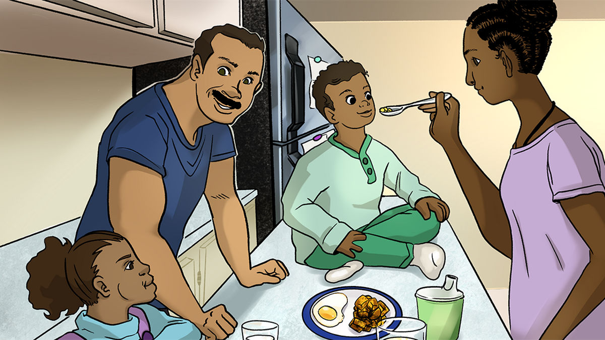 A family shares a meal together.