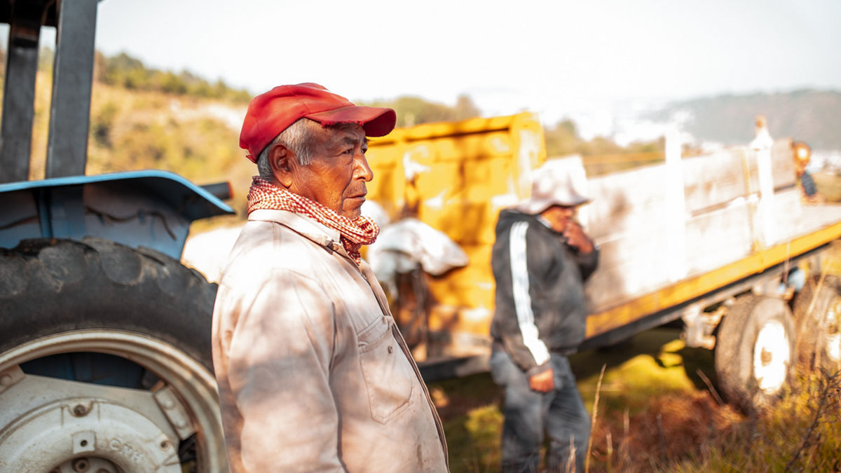 Portrait of tired farmers, taking a break