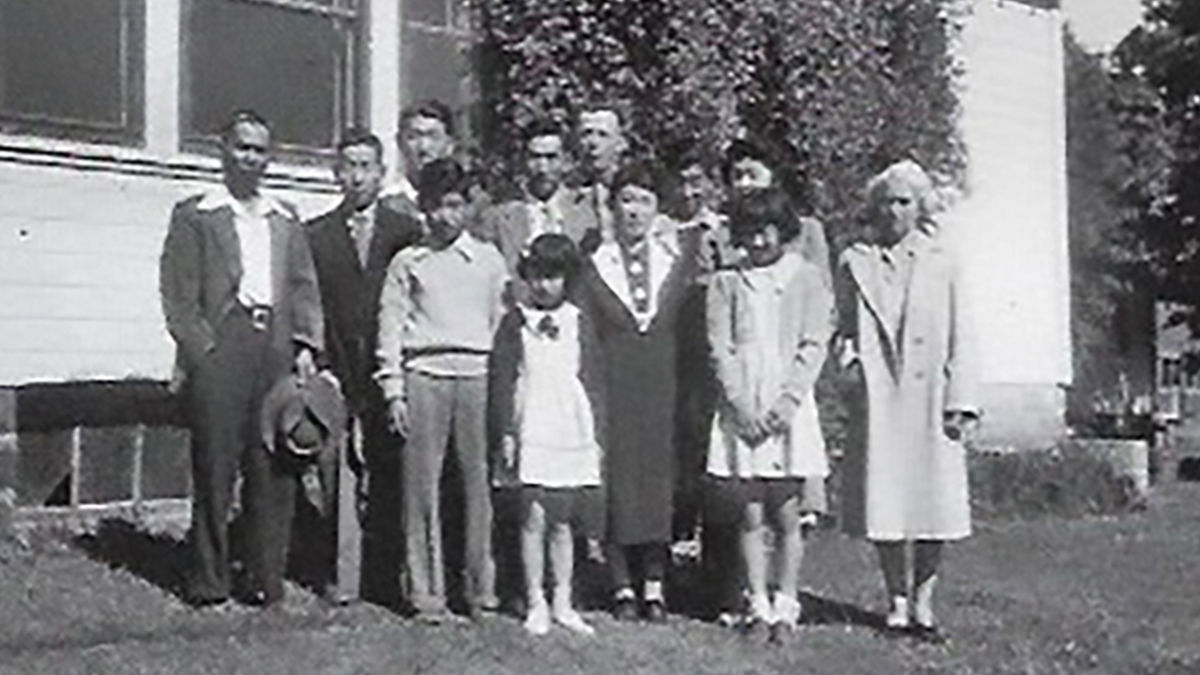Dr. Morita's father's family with neighbors in Oregon just before they were forcibly removed from their homes and incarcerated without due process in internment camps.