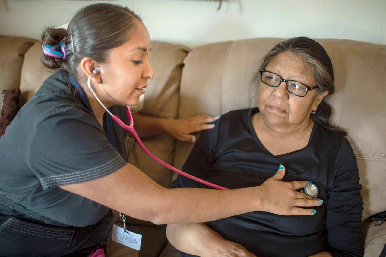 Photos of Community Health Representatives â   Home Visits  at Taos Pueblo, NM for Robert Wood Johnson Foundation Culture of Health Prize, Thursday, May 22, 2014. (AP photo/Craig Fritz)