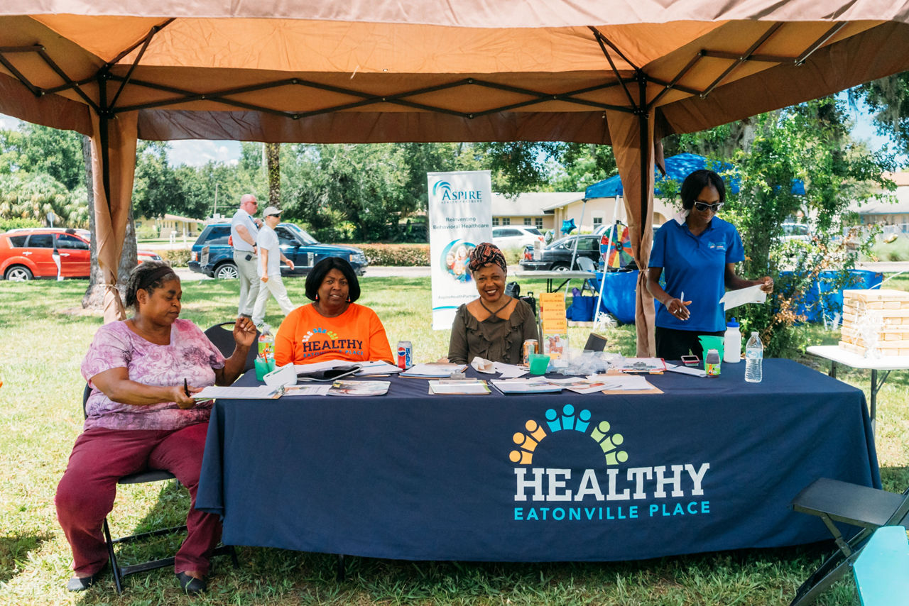 Veronica, Connie, Kay & Pradley providing healthy lifestyle options at their Healthy Eatonville Place (HEP) booth.