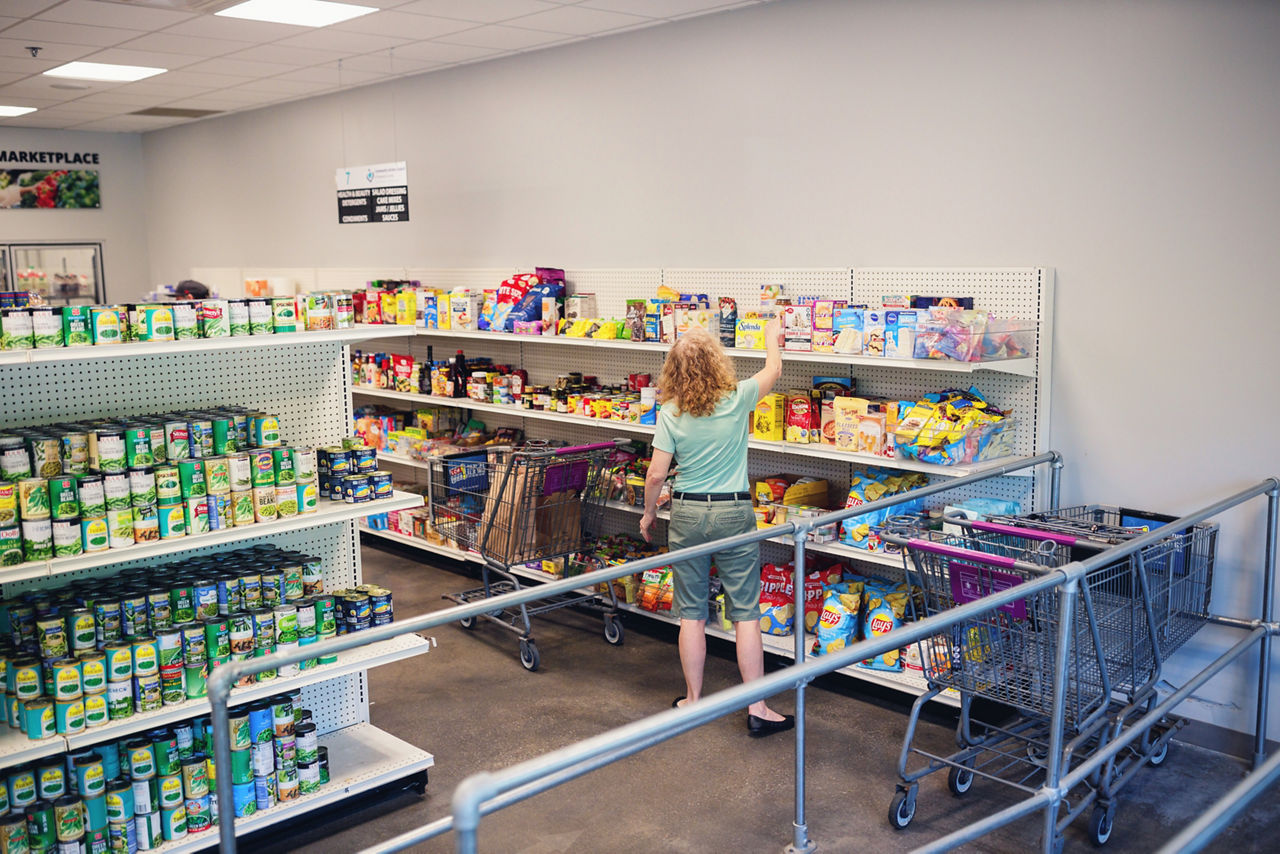 [NOTE: Film crew has the releases/names for everyone here]The Howard County Food Bank provides a dignified experience for those who needs its services. It offers a grocery-store-like environment where people can “shop” for fresh and canned foods as well as health and hygiene products.