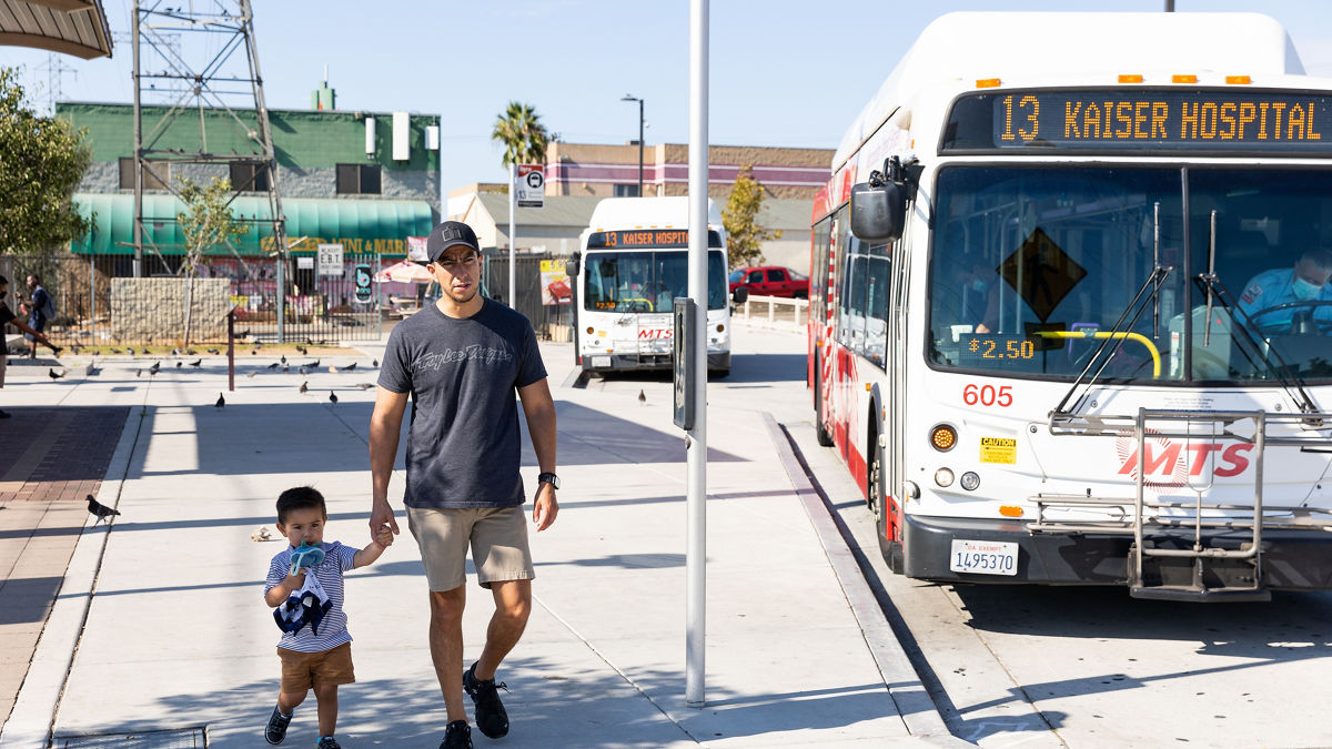 David Rodriguez takes his 2 year old son Oliver to the 24th Street Trolley and Transit Station in National City, California to look at the trolleys and buses pass by.