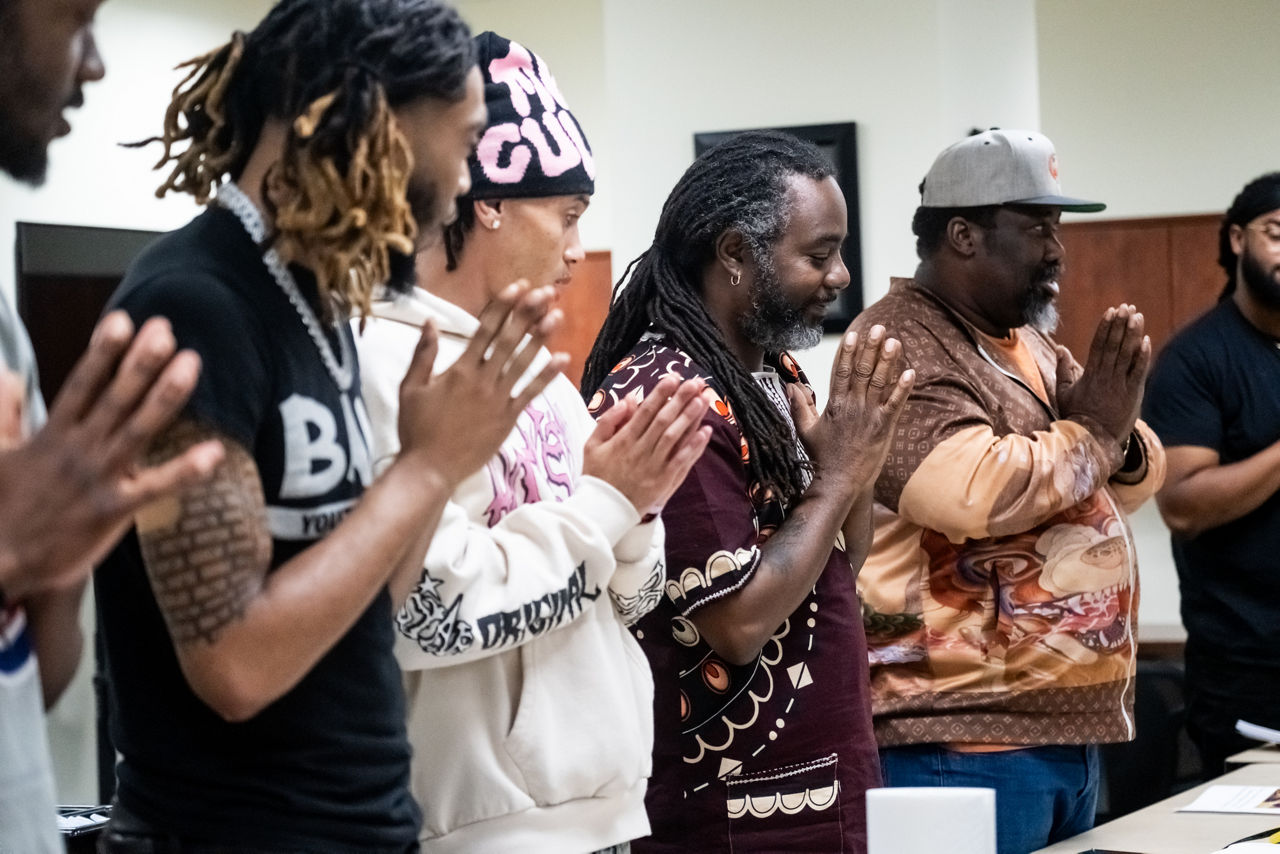 Minkara Tezet (center) of the Cultural Wellness Center helps lead a group activity on September 14 at the Rites of Passage gathering at Ujamaa Place in St. Paul, MN on September 14, 2023.