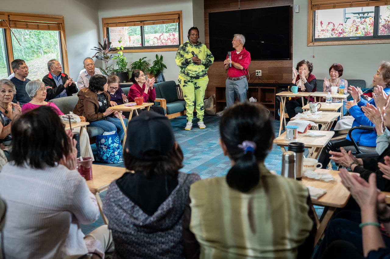 Lateshia Carter from the Cultural Wellness Center, as part of their Trusted Messenger Program, speaks to a group of South Asian and Southeast Asian adults at the Wilder Center for Social Healing in St. Paul, MN on September 15, 2023.