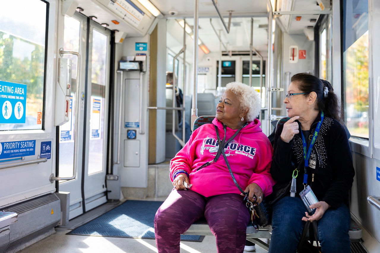 Paulette Davidson and her neighbor Nancy Oliver ride the Tacoma Link Light Rail to the Tacoma Housing Authority in Tacoma, Washington on October 5, 2023 to ask for rental assistance for Paulette.