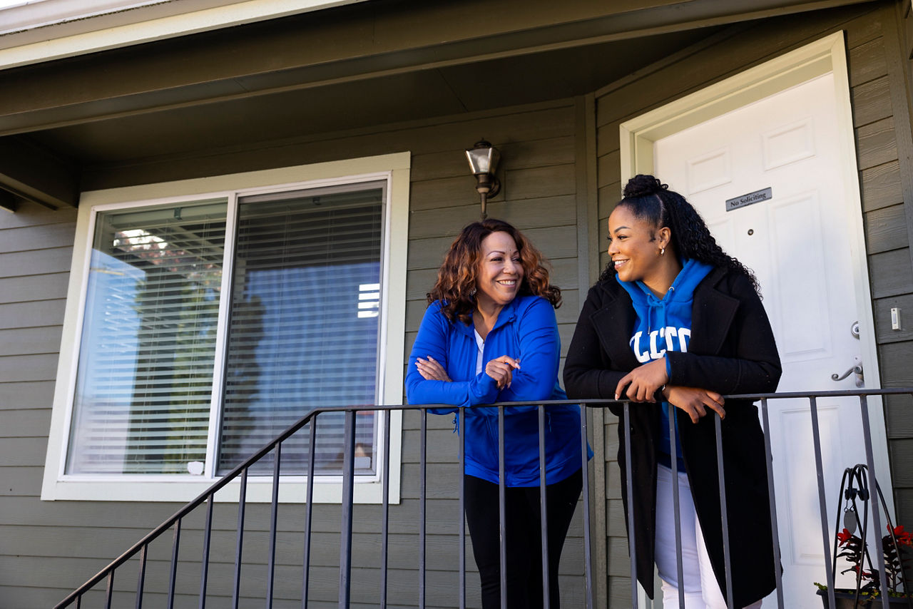Tacoma City Council member Kiara Daniels and her mother Sandra Daniels stand in front of their home in the historically black Hilltop neighborhood of Tacoma, Washington on October 5, 2023.  Daniels was inspired to buy her own home after watching her mother lose their family home during the recession in 2007. She ran for council in 2020 on a platform of lessening barriers to affordable housing and home ownership.