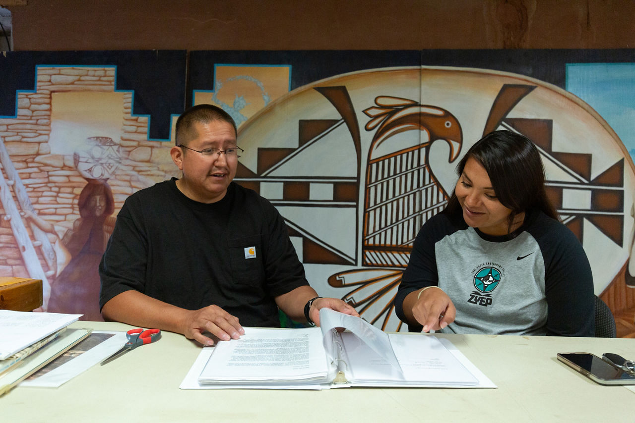 Curtis Quam, Director of the A:shiwi A:wan Museum and Heritage Center, and Tahlia Natachu, Executive Director of the Zuni Youth Enrichment Program discussing A:shiwi programs.