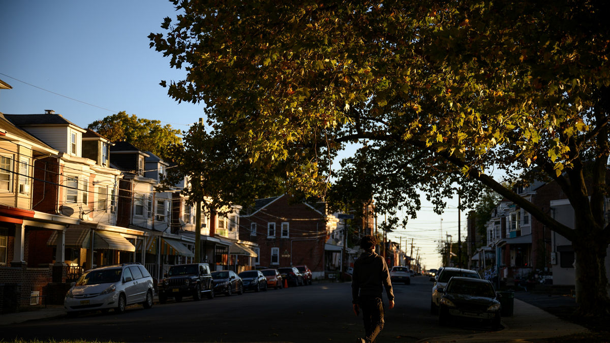 A teen walks a path at Martin Luther King, Jr. Park in Trenton, NJ on October 16, 2024.