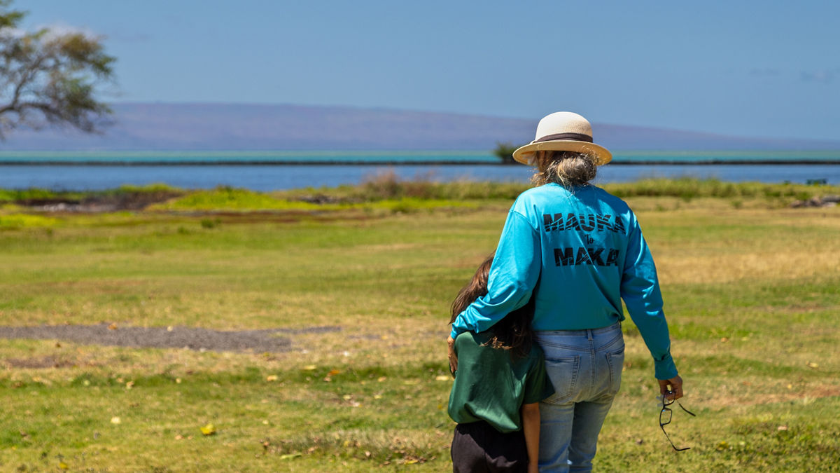 Loretta Ritte and her grandchild at Keawanui Fishpond and Cultural Learning Center. ‘Āina Momona, a nonprofit stewards the area, which also serves as a space for ROOTed, an alternative learning program and homeschool.