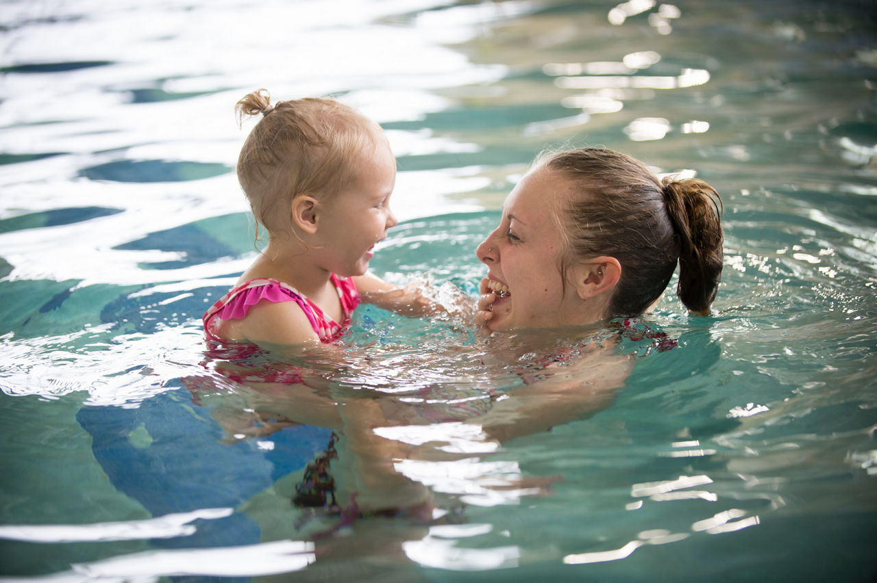 Melissa Marple, a Garrett County resident, plays with her daughter, Braylon Marple, 2, at the Community Aquatic and Recreation Center in McHenry, Maryland during the open swim session on Saturday.