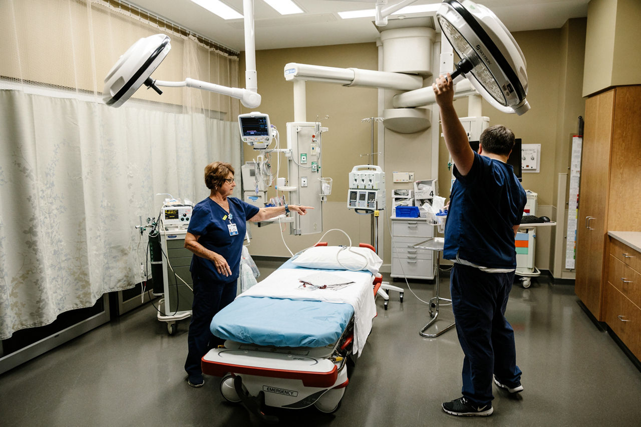 Iola, KS - August 1, 2017 - Judy Highberger and Tanner Lewis set up an emergency exam room, part of the new Allen County Regional Hospital in Iola.