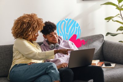 Family talking and making a plan on couch.