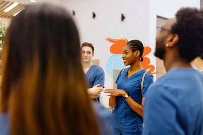 Medical residents gathered together for meeting.