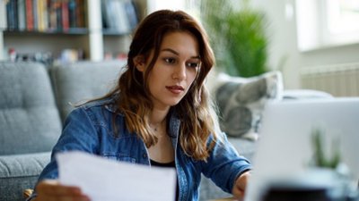 Woman working on computer.