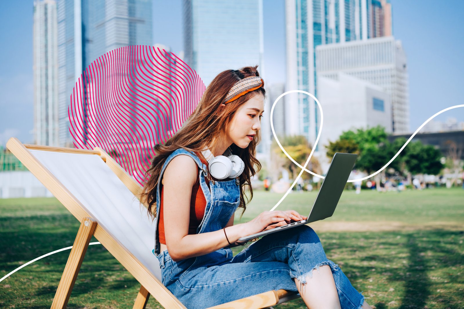 Undergraduate student enjoying a nice day on campus on a lawn chair.