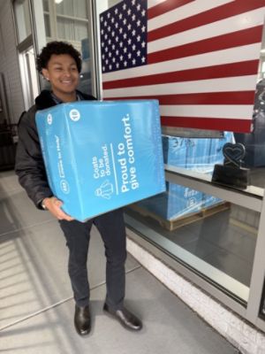 New Coats and Shoes for our local youth