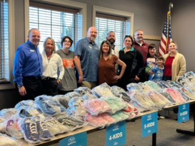 "Stepping Up for the Community: Tom Wood Subaru's Mission to Help Local Kids"