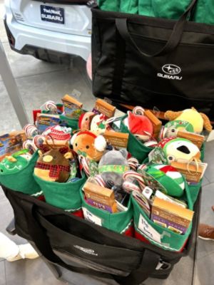 Santa's Helpers...Paul Moak Subaru Donates Christmas Stockings for Children in Need