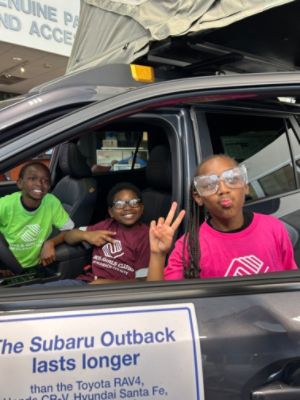 CHILDREN FROM BOYS & GIRLS CLUBS OF PALM BEACH COUNTY EXPLORE ADVENTURE IN THE SUBARU SHOWROOM