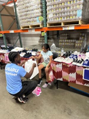 Schumacher Subaru of Delray Donates Brand-New Shoes and Socks to Children in Our Community