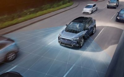 Solterra Electric Vehicle showing EyeSight Driver Assist Technology camera visibility.