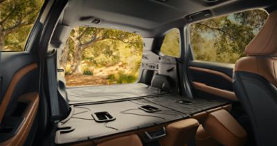 Spacious cargo area with 60/40-split flat-folding rear seatbacks shown with accessory equipment