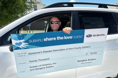 Sangera Subaru donates $20k to ADAKC.