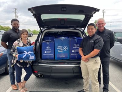 The Leukemia & Lymphoma Society and Flow Subaru Burlington delivery to Cone Health Cancer Center