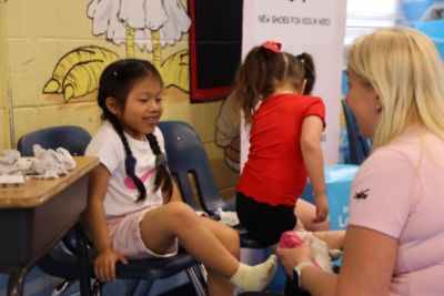 Subaru of Naples & Laces of Love Donate Jackets, Shoes, and Socks to Shadowlawn Elementary!