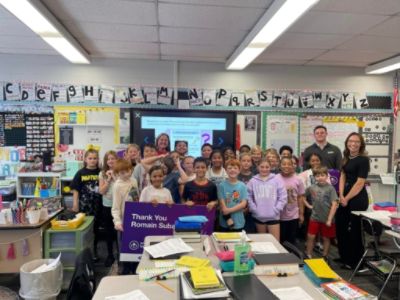 Driving Education Forward: Romain Subaru Donates Supplies to Hebron Elementary