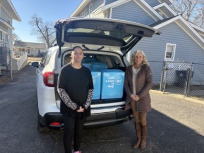 Brown Subaru Loves to Help: Warming Hearts at Martha's Home