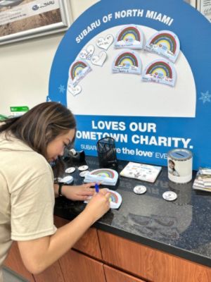 Subaru North Miami Shares Love: Uniting for Children's Health and Nationwide Charities.
