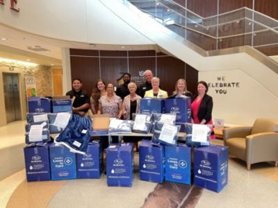 The Leukemia & Lymphoma Society and Flow Subaru Burlington delivery to Cone Health Cancer Center